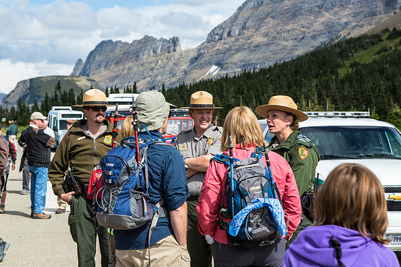 Rangers Chatting with Visitors
