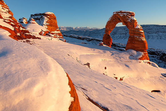 Snowy Delicate Arch Sunset