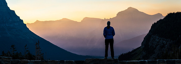 St. Mary Valley Sunrise Panorama with Hiker