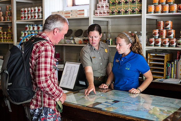 Rangers helping a Visitor