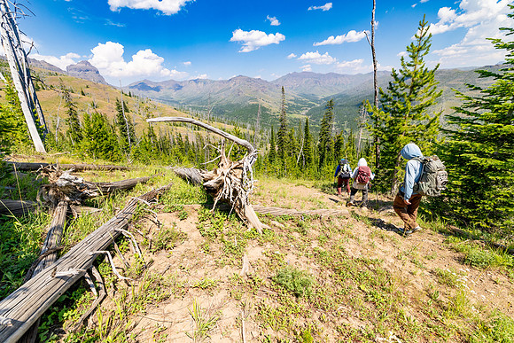 Hikers on the Thunderer Cutoff Trail headed to Cache Creek Trail