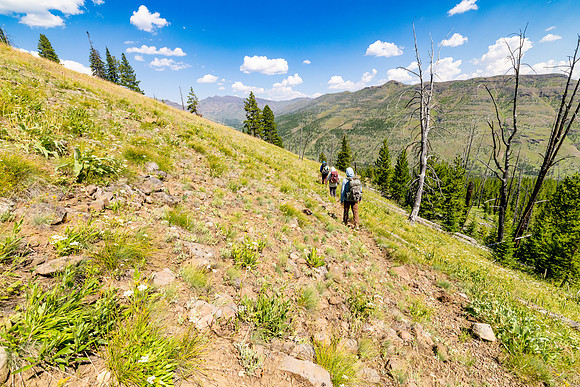 Hikers on the Thunderer Cutoff Trail headed to Cache Creek Trail