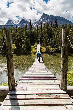 James Crossing the Belly River Suspension Brodge