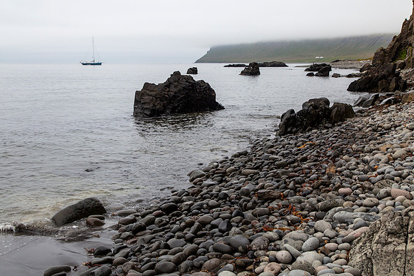 Hornvik coastline and sailboat