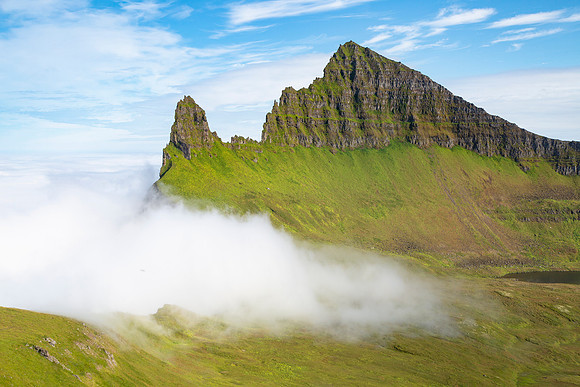 Clouds roll over the base of Hornbjarg