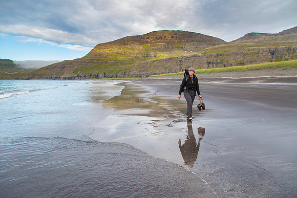 Corrie walking on the beach back to camp
