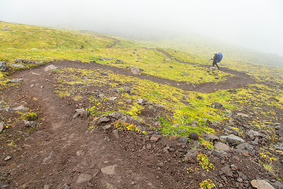 Corrie hiking down from the pass