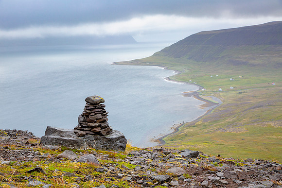 Hesteyri and cairn from the pass