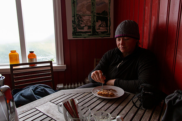 Corrie enjoying Rhubarb cake in Hesteyri
