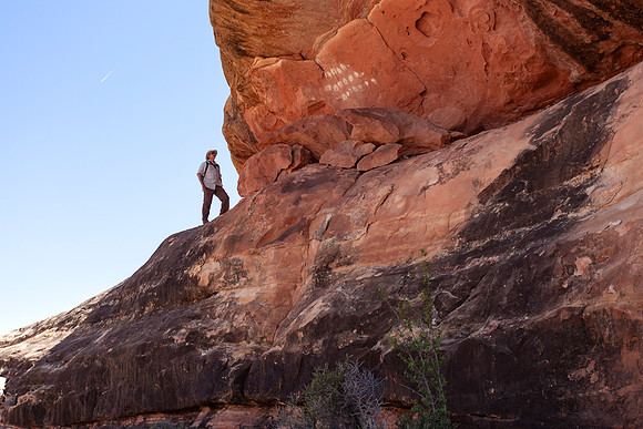 Hiker Examining Arc Site