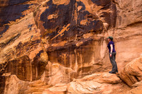 Hiker viewing the petroglyphs